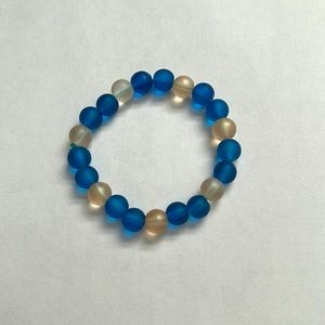 I made this handcrafted, stylish, cheap, unisex, beaded bracelet.